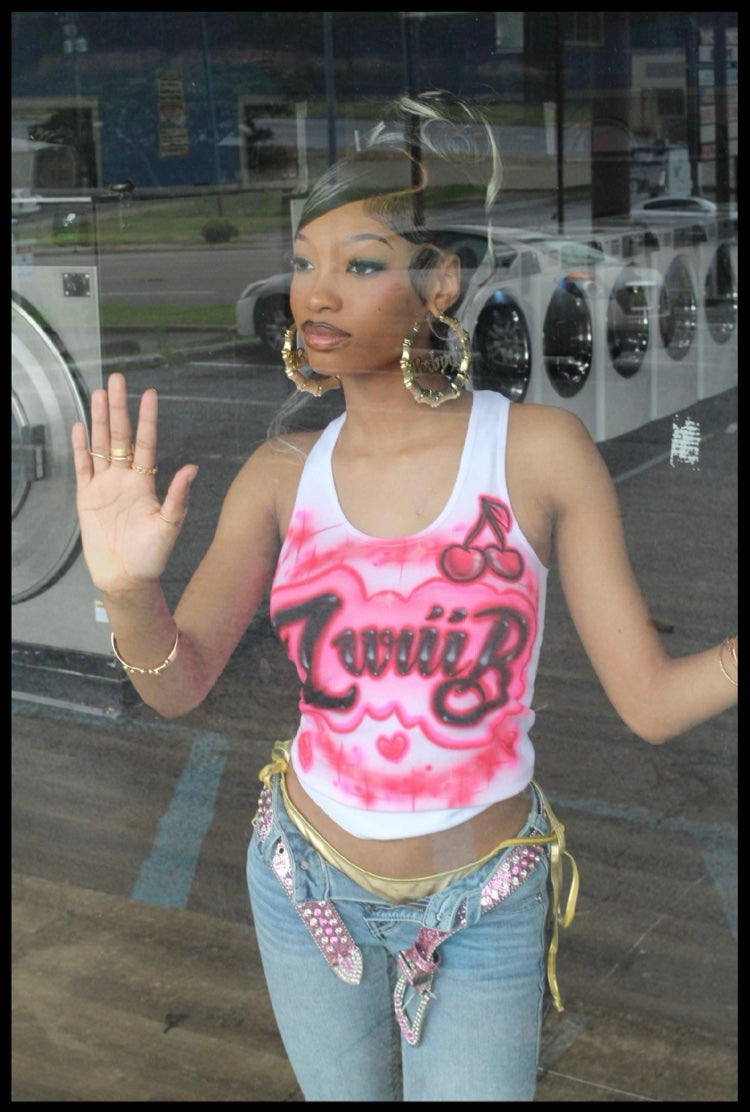 Customer wearing pink cherry airbrush tank top